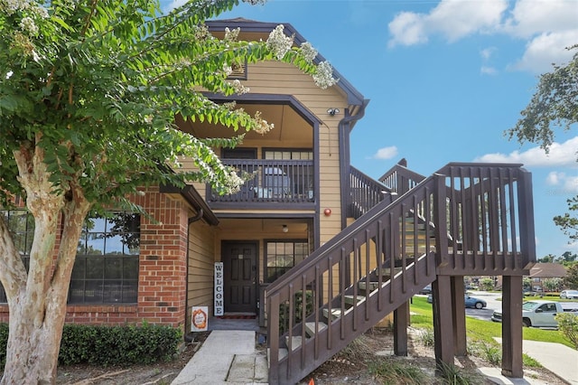 364 Northpointe Ct Unit 208, Altamonte Springs, FL 32701 - view of building exterior featuring stairs
