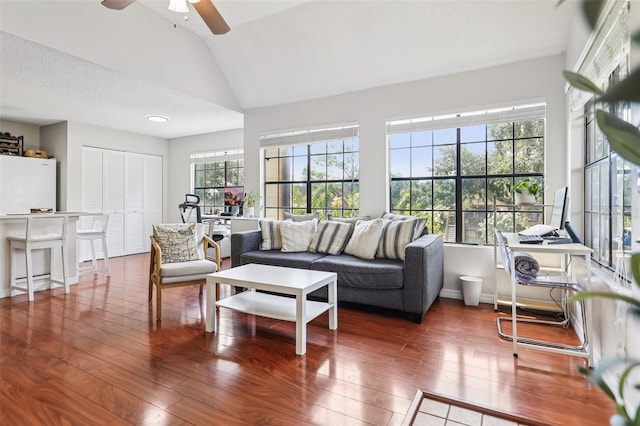 364 Northpointe Ct Unit 208, Altamonte Springs, FL 32701 - living area with wood-type flooring, lofted ceiling, and a ceiling fan
