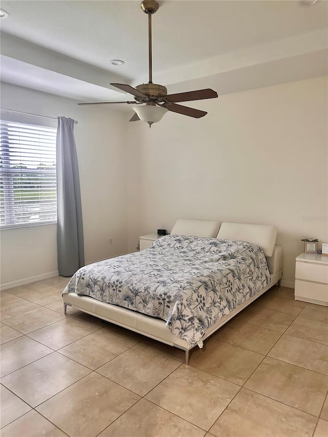 10110 SW Chadwick Dr, Port St Lucie, FL 34987 - bedroom featuring light tile patterned floors and ceiling fan
