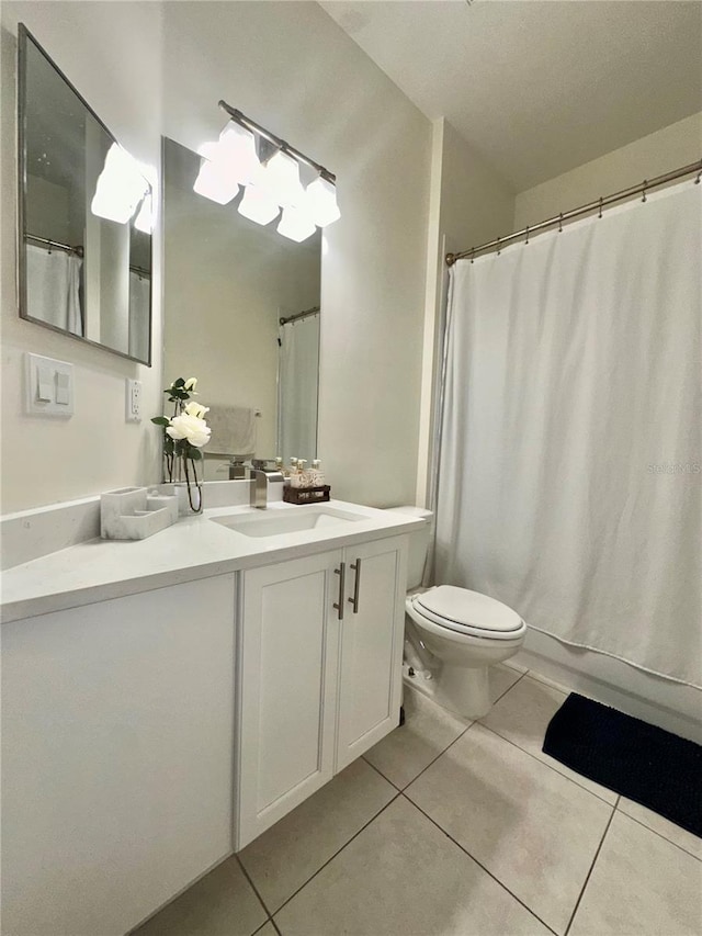 10110 SW Chadwick Dr, Port St Lucie, FL 34987 - full bath with tile patterned flooring, vanity, and curtained shower