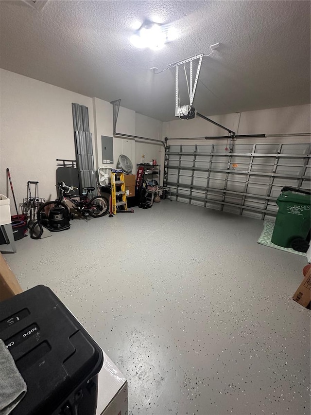 10110 SW Chadwick Dr, Port St Lucie, FL 34987 - garage with electric panel and a garage door opener