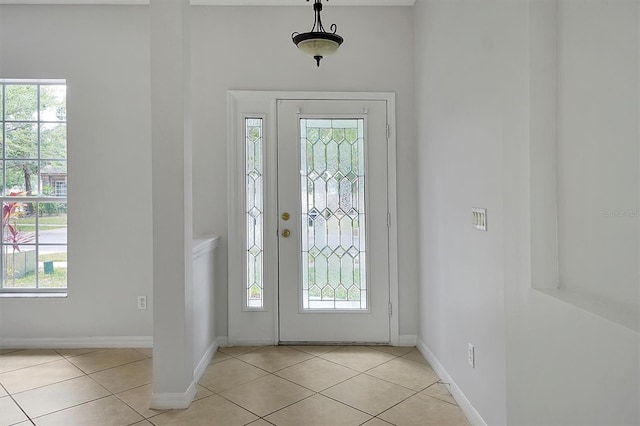 9049 Edenshire Cir, Orlando, FL 32836 - foyer featuring light tile patterned floors