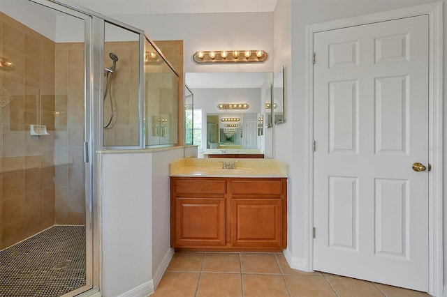 9049 Edenshire Cir, Orlando, FL 32836 - bathroom with tile patterned flooring, vanity, and a stall shower