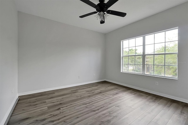 9049 Edenshire Cir, Orlando, FL 32836 - unfurnished room featuring wood finished floors and ceiling fan