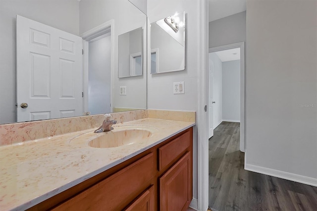 9049 Edenshire Cir, Orlando, FL 32836 - bathroom featuring vanity and wood finished floors
