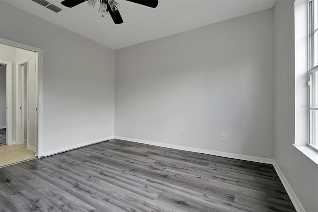 9049 Edenshire Cir, Orlando, FL 32836 - unfurnished room featuring ceiling fan and wood finished floors