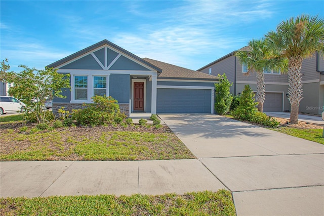 786 Steerview St, Saint Cloud, FL 34771 - ranch-style house featuring stucco siding, driveway, an attached garage, and stone siding