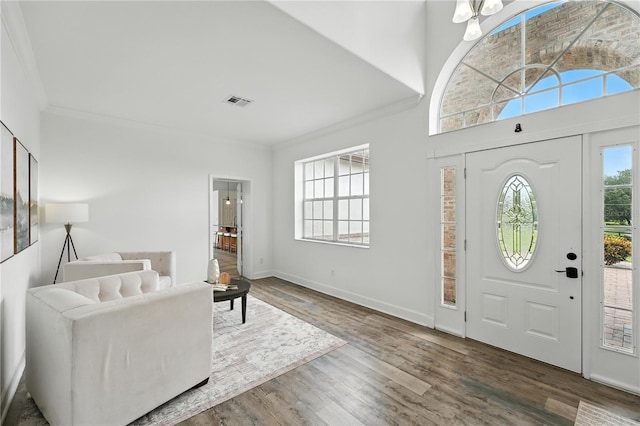 15350 Arabian Way, Montverde, FL 34756 - entrance foyer with ornamental molding and wood finished floors