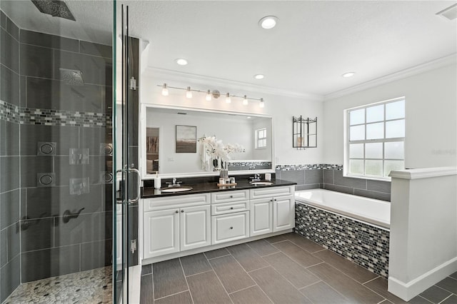 15350 Arabian Way, Montverde, FL 34756 - full bath with a shower stall, double vanity, crown molding, a garden tub, and recessed lighting