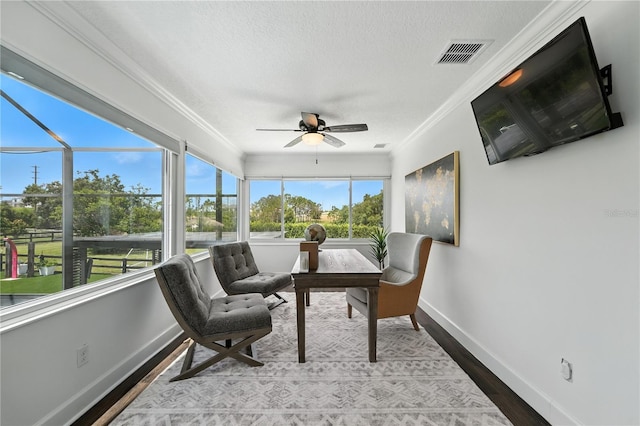 15350 Arabian Way, Montverde, FL 34756 - sunroom / solarium with crown molding, wood finished floors, and a textured ceiling