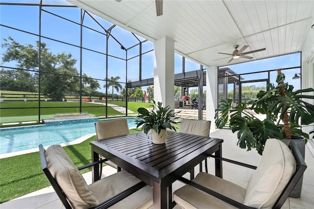 15350 Arabian Way, Montverde, FL 34756 - sunroom featuring a ceiling fan and outdoor dining space