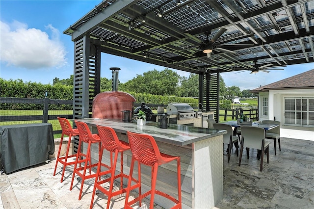 15350 Arabian Way, Montverde, FL 34756 - view of patio featuring exterior kitchen and ceiling fan