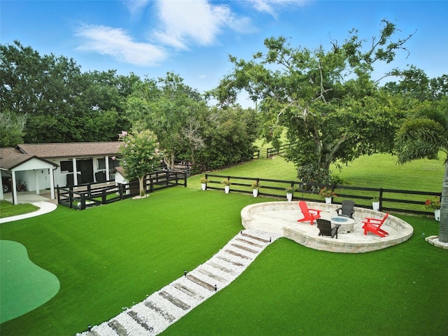 15350 Arabian Way, Montverde, FL 34756 - view of yard featuring a patio area and a fire pit