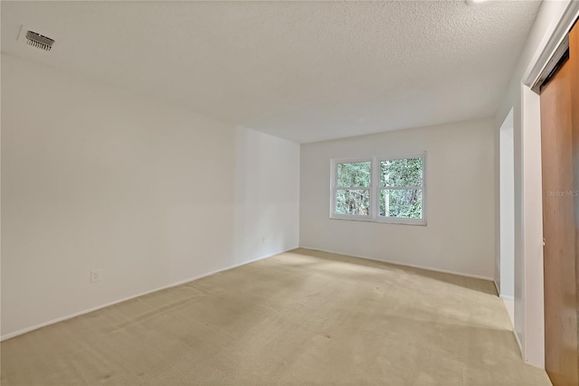 877 Great Bend Rd, Altamonte Springs, FL 32714 - unfurnished room featuring light colored carpet and a textured ceiling