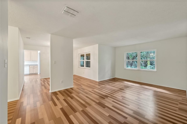 877 Great Bend Rd, Altamonte Springs, FL 32714 - empty room with light wood finished floors and baseboards