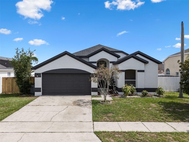 2898 Picadilly Cir, Kissimmee, FL 34747 - ranch-style home with stucco siding, an attached garage, and concrete driveway