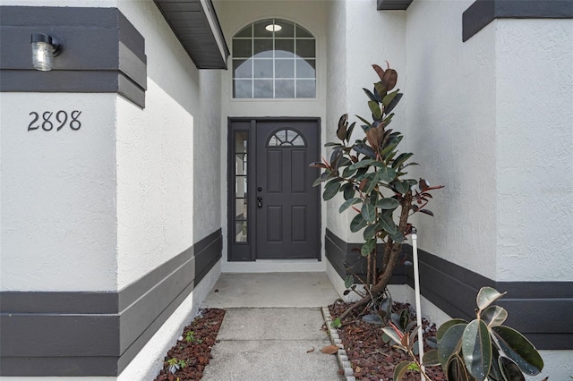 2898 Picadilly Cir, Kissimmee, FL 34747 - entrance to property with stucco siding