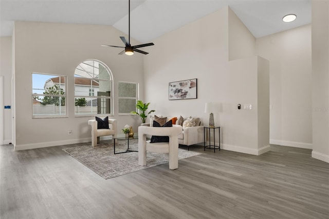 2898 Picadilly Cir, Kissimmee, FL 34747 - living room with wood finished floors, high vaulted ceiling, and a ceiling fan
