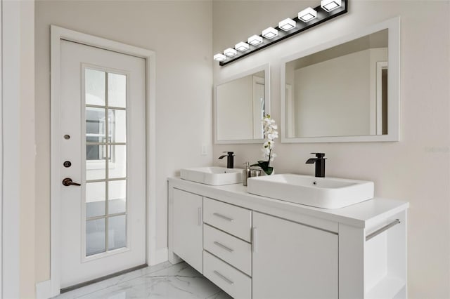 2898 Picadilly Cir, Kissimmee, FL 34747 - full bathroom featuring double vanity and marble look tiles