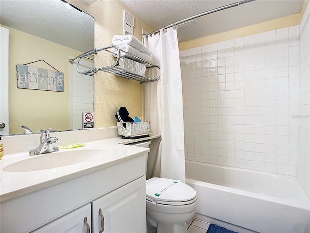 701 S Atlantic Ave Unit 504, Daytona Beach, FL 32118 - full bath featuring vanity, shower / tub combo, tile patterned flooring, and a textured ceiling