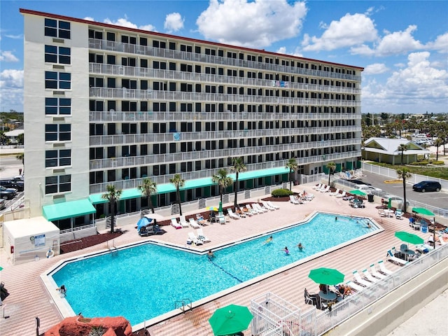 701 S Atlantic Ave Unit 504, Daytona Beach, FL 32118 - community pool featuring a patio area