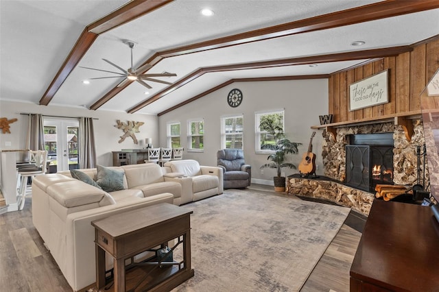 11815 Lake Susan, Clermont, FL 34711 - living room with ceiling fan, light wood-style flooring, french doors, a stone fireplace, and recessed lighting