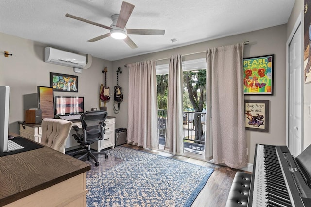 11815 Lake Susan, Clermont, FL 34711 - home office with a wall mounted AC, wood finished floors, ceiling fan, and a textured ceiling