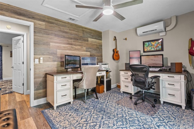 11815 Lake Susan, Clermont, FL 34711 - office space with a wall unit AC, wooden walls, ceiling fan, wood finished floors, and an accent wall