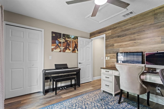 11815 Lake Susan, Clermont, FL 34711 - office area with wood walls, a ceiling fan, and wood finished floors
