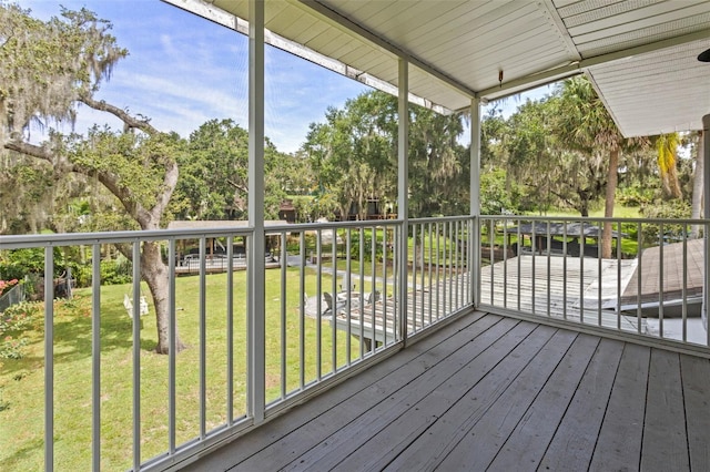 11815 Lake Susan, Clermont, FL 34711 - wooden terrace with view of wooded area and a lawn
