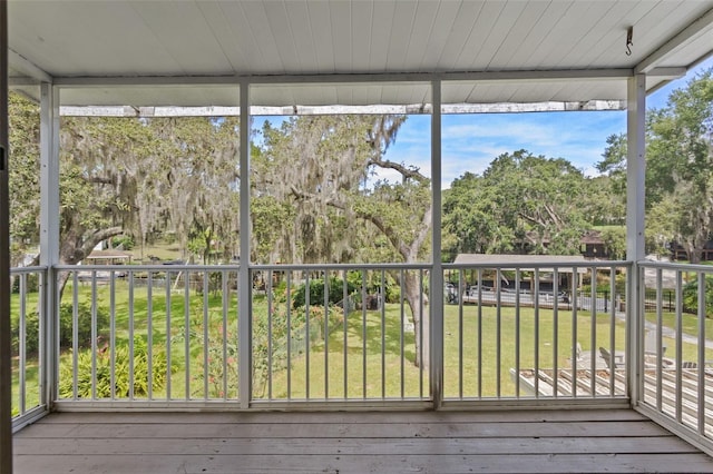 11815 Lake Susan, Clermont, FL 34711 - unfurnished sunroom with view of scattered trees