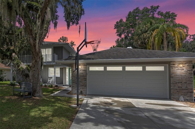 11815 Lake Susan, Clermont, FL 34711 - view of front of home with driveway, brick siding, a garage, a front yard, and a balcony