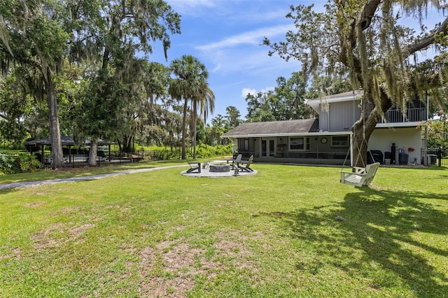 11815 Lake Susan, Clermont, FL 34711 - view of green lawn with a fire pit