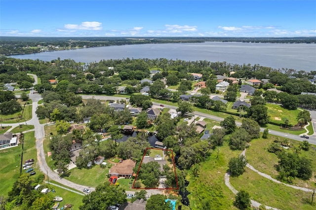 11815 Lake Susan, Clermont, FL 34711 - aerial view of residential area with property boundaries highlighted and a nearby body of water