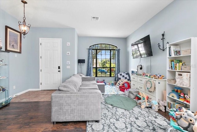 523 Lake Davenport Cir, Davenport, FL 33837 - living area featuring wood finished floors and baseboards