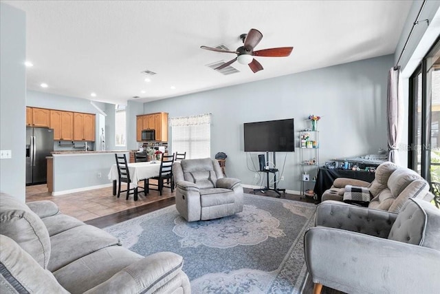 523 Lake Davenport Cir, Davenport, FL 33837 - living area featuring ceiling fan, recessed lighting, and light wood-type flooring