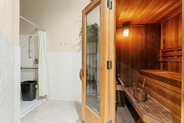 523 Lake Davenport Cir, Davenport, FL 33837 - relaxing sauna with wood ceiling, wood walls, and wainscoting