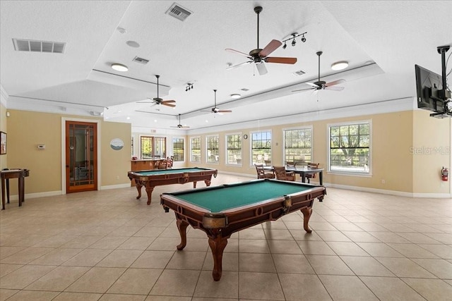 523 Lake Davenport Cir, Davenport, FL 33837 - rec room featuring a tray ceiling, pool table, plenty of natural light, ornamental molding, and a textured ceiling