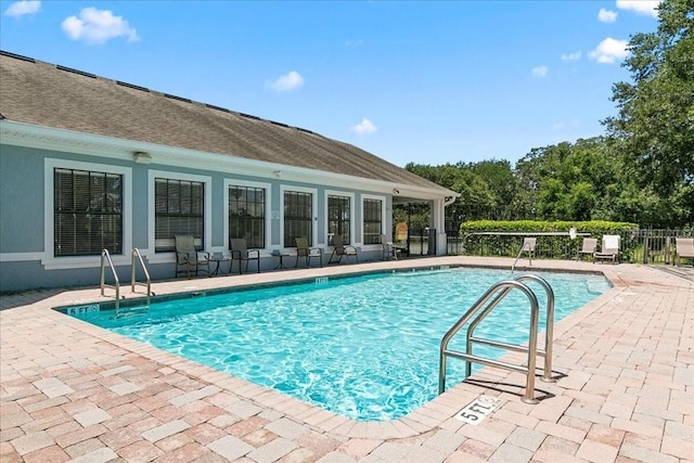 523 Lake Davenport Cir, Davenport, FL 33837 - community pool featuring a patio