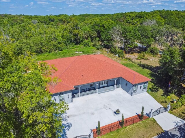 15715 Trousdale St, Clermont, FL 34715 - view of subject property with a forest