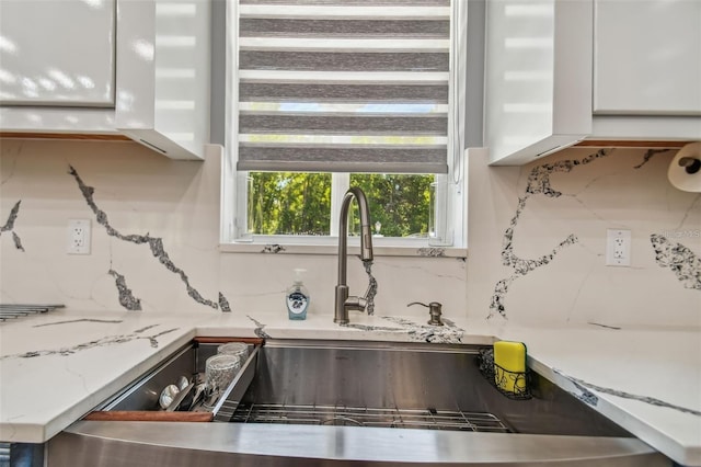 15715 Trousdale St, Clermont, FL 34715 - kitchen view of tasteful backsplash and white cabinetry