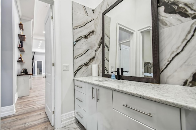15715 Trousdale St, Clermont, FL 34715 - bathroom with vanity and wood finished floors