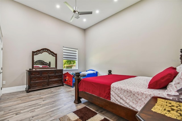 15715 Trousdale St, Clermont, FL 34715 - bedroom featuring wood finished floors, recessed lighting, a high ceiling, and ceiling fan