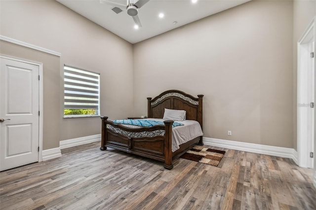 15715 Trousdale St, Clermont, FL 34715 - bedroom featuring wood finished floors, a ceiling fan, and recessed lighting