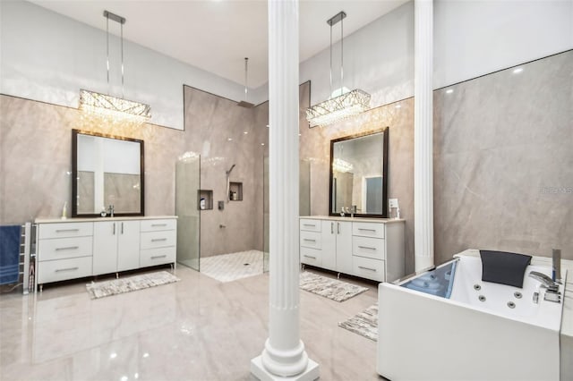 15715 Trousdale St, Clermont, FL 34715 - bathroom with walk in shower, a tub with jets, tile walls, two vanities, and marble finish flooring