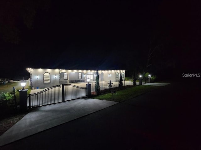 15715 Trousdale St, Clermont, FL 34715 - view of front of property featuring a gate