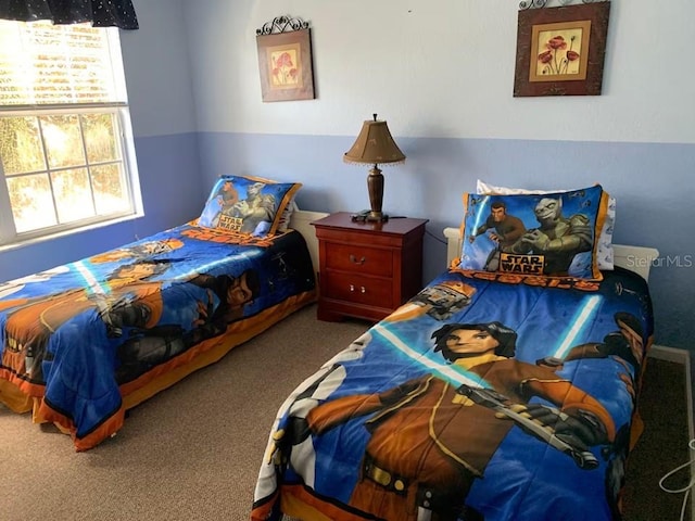 7763 Tosteth St, Kissimmee, FL 34747 - bedroom with carpet flooring