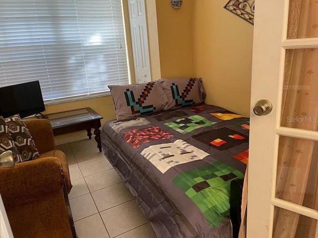 7763 Tosteth St, Kissimmee, FL 34747 - view of tiled bedroom