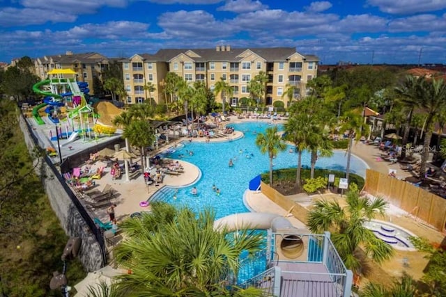 7763 Tosteth St, Kissimmee, FL 34747 - community pool featuring a water slide