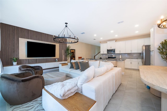 1660 Tropical Palms Cir, Kissimmee, FL 34747 - living area with a chandelier, recessed lighting, and light tile patterned flooring